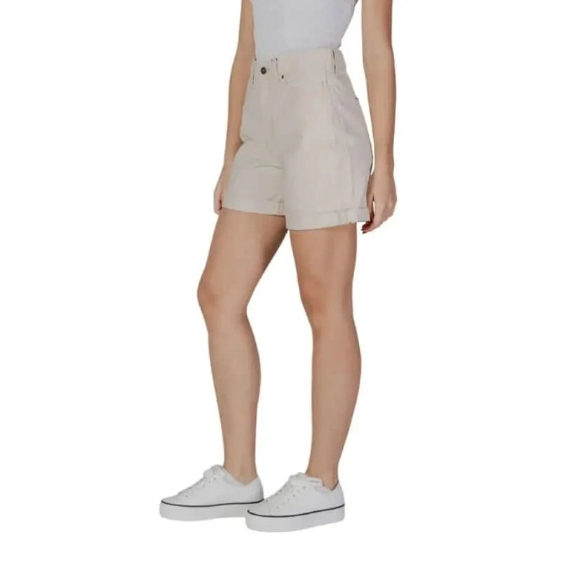 Woman wearing B.young Beige Cotton Shorts with Pockets for a stylish summer look