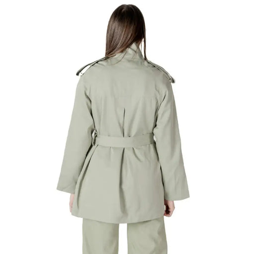 Women’s Belted Sage Green Trench Coat showcasing timeless style and elegant design