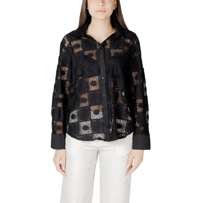 Woman’s black lace button-down shirt displayed in a product listing