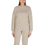 Women’s beige crewneck sweatshirt with GUESS rhinestone logo front view