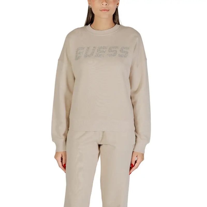 Women’s beige crewneck sweatshirt with GUESS rhinestone logo front view