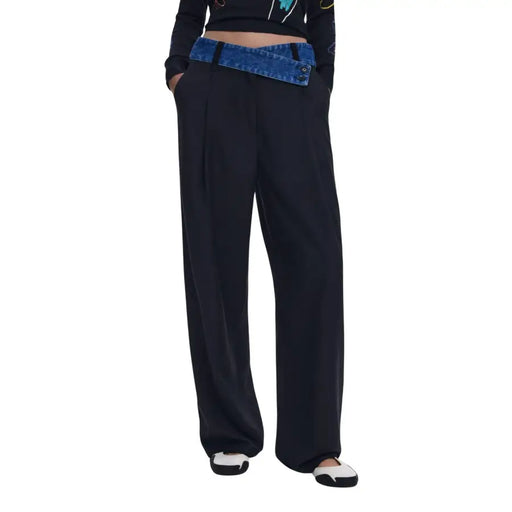 Women’s black wide-leg trousers with a blue denim-style waistband from Desigual for fall winter
