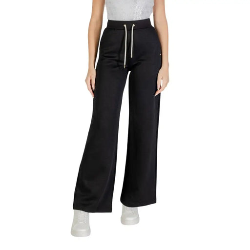 Women’s black wide-leg sweatpants with white drawstring from Guess Active for fall winter