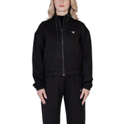 Women’s black zip-up athletic jacket from Guess Active, featuring a hood and sporty design
