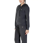 Women’s black zip-up hoodie and sweatpants set with small triangle logos for Guess Active Women