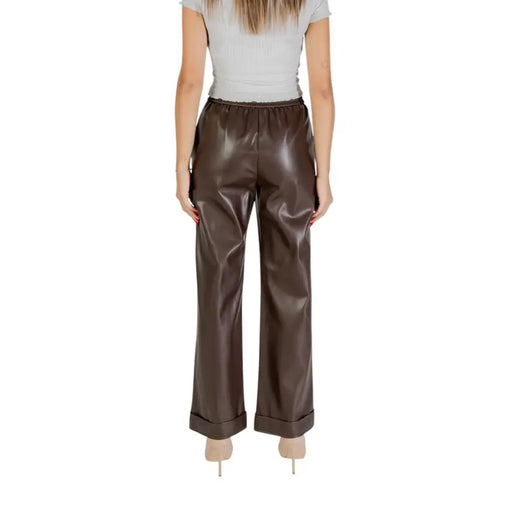 Women’s brown faux leather wide-leg trousers with elastic waist and cuffed hems for Fall Winter style