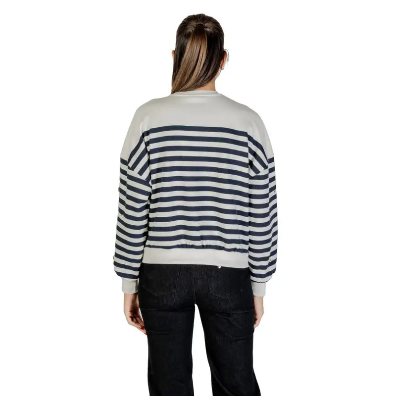 Women wearing Blue Striped Rhinestone Long Sleeve Round Neck Sweatshirt with black pants
