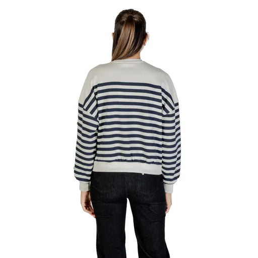 Women wearing Blue Striped Rhinestone Long Sleeve Round Neck Sweatshirt with black pants