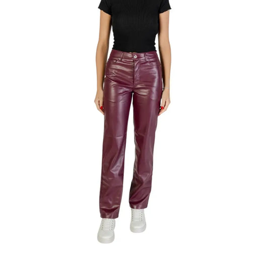 Women’s high-waisted burgundy faux leather trousers with button and zipper closure