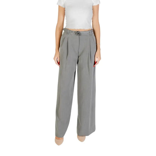 Women’s high-waisted wide-leg gray trousers with pleats and decorative belt buckle