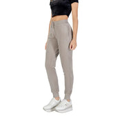 Women’s taupe slim-fit joggers with drawstring waist and ribbed cuffs from Guess Active Women Beige collection