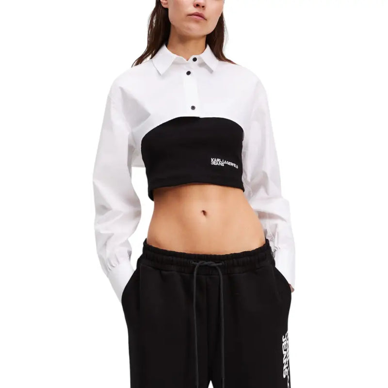 Women wearing Karl Lagerfeld Jeans white cropped button-up shirt with black bandeau and sweatpants