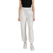 Women’s white leather-look sweatpants displayed with Guess Active Women Black Printed Trousers with Laces
