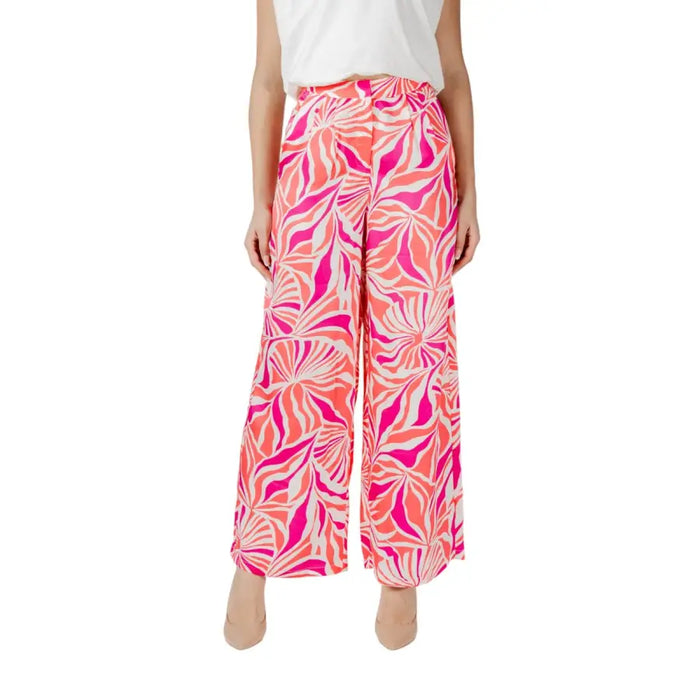 Women’s wide-leg palazzo pants with pink, orange, and white abstract leaf pattern