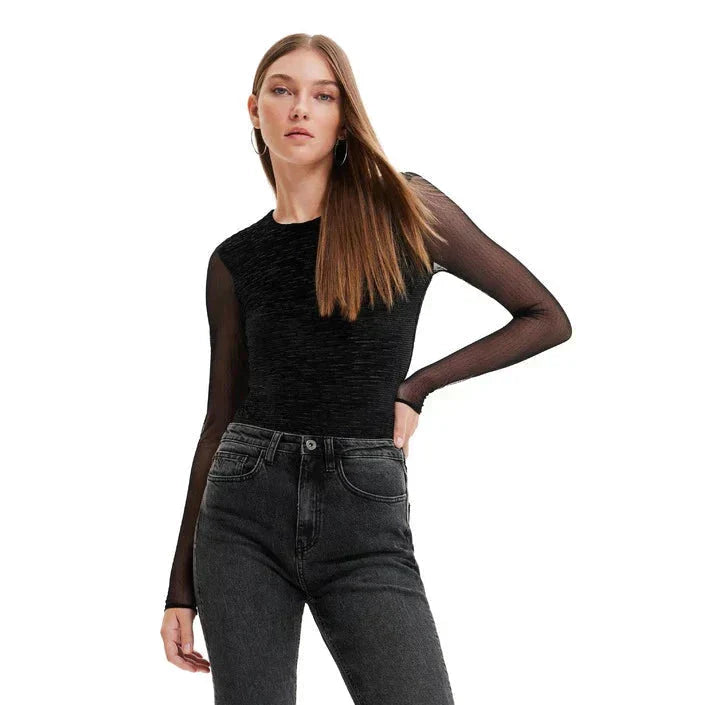 Woman in black top from Urban City Styles collection