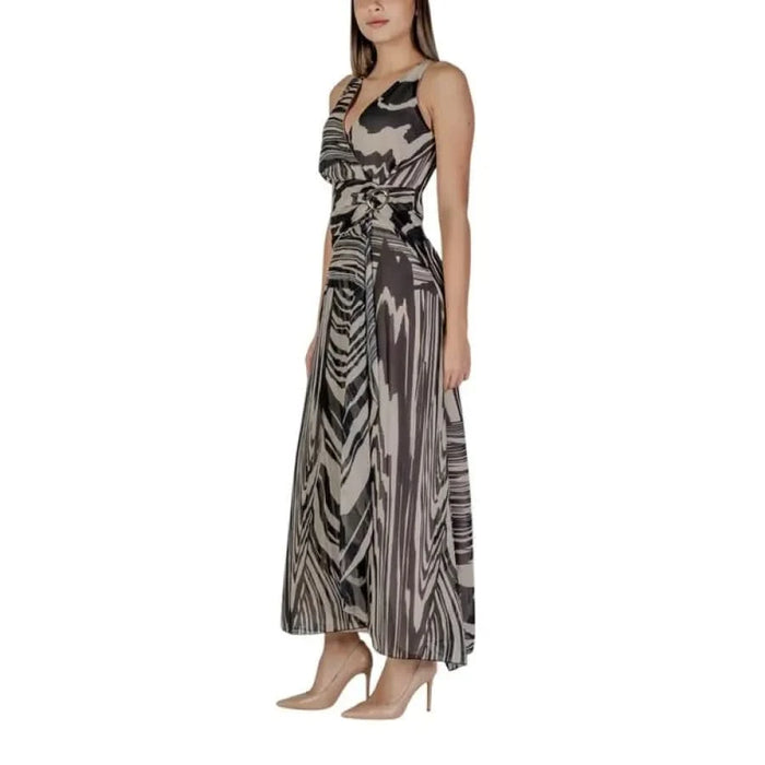 Rinascimento Beige Leopard Dress featuring an abstract-print maxi design in polyester
