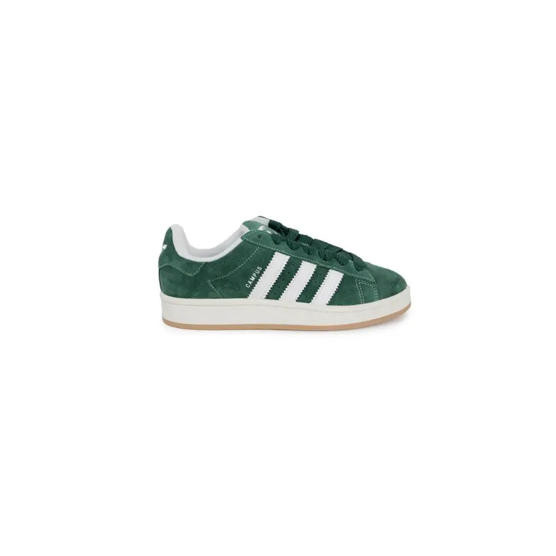 Green adidas gazelle sneakers with white stripes and suede upper.