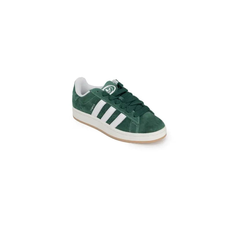 Green adidas gazelle sneakers with white stripes and gum soles.