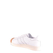 Adidas Baskets blanches en cuir pour homme, modèle 35571, avec bout renforcé en caoutchouc beige et semelle en gomme.
