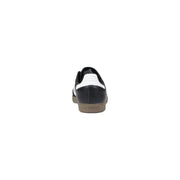 Adidas Baskets en cuir noir et blanc pour homme, semelle en gomme, idéales pour le printemps et l'été.