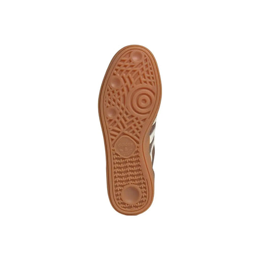 Tan rubber sole with textured pattern and adidas logo embossed near the heel of adidas originals men handball spezial sneakers