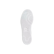 Semelle arrière des baskets blanches adidas Originals pour homme, en matière synthétique verte, avec motif nid d'abeille et logo trèfle en relief.