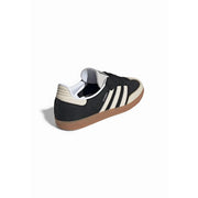 Adidas Originals women leather samba sneakers black featuring three white stripes gum sole and beige heel accents