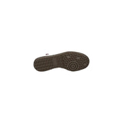 Brown rubber sole with textured tread and circular grip design on adidas originals women leather sneakers bordeaux