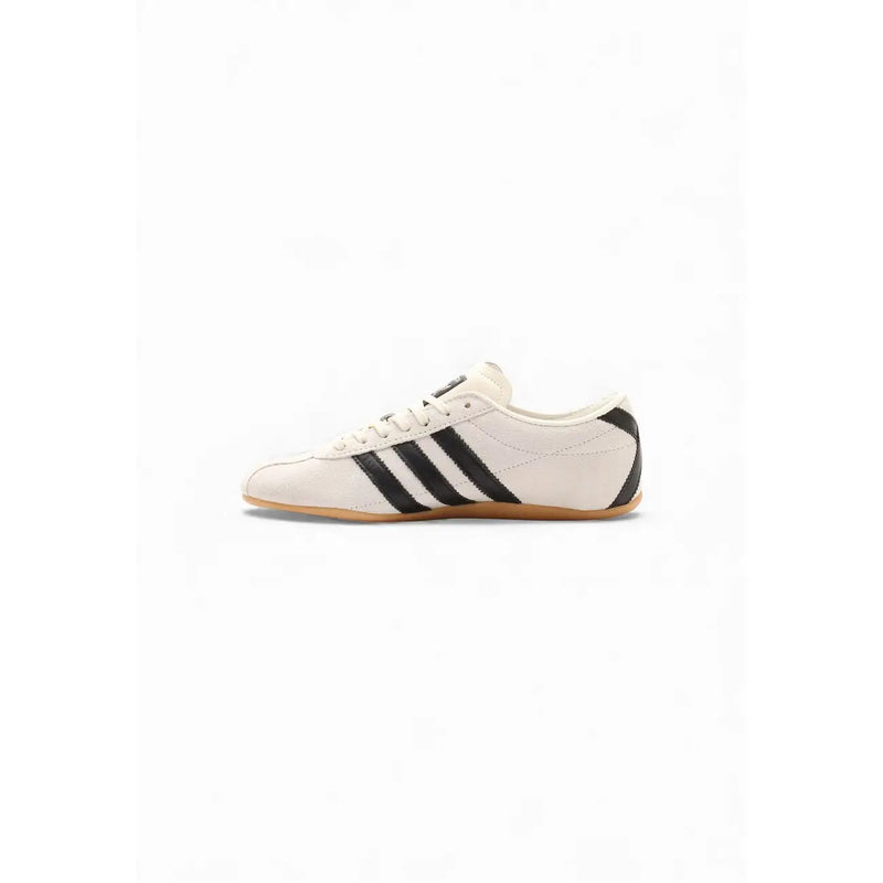 Cream-colored adidas originals women suede sneakers with black 三条纹 stripes and tan rubber sole
