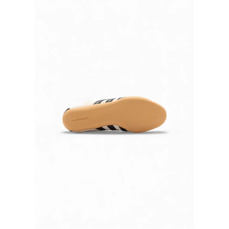 Adidas Originals women suede sneakers in white with black stripes and tan rubber sole for casual wear