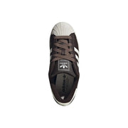 Adidas women leather superstar sneaker in brown with white rubber toe cap and three stripes design