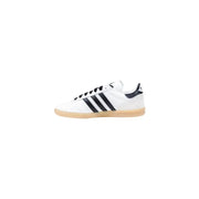 Adidas women white faux leather slip on sporty sneakers with black three stripes navy heel tab and gum rubber sole