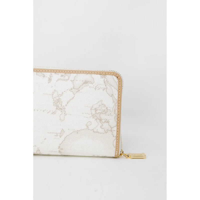 Portefeuille blanc zippé pour femme Alviero Martini Prima Classe, orné d'une discrète carte du monde, de surpiqûres beiges et d'une tirette dorée.