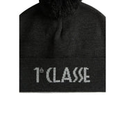 Black knit wool beanie by alviero martini with fuzzy pom-pom and white 1ère classe embroidery