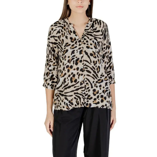 Animal print blouse with three-quarter sleeves perfect for stylish casual wear