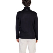 Black turtleneck sweater with ribbed cuffs and hem, made of soft cotton