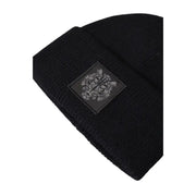 Black beanie with skull design on front