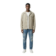 Antony Morato men beige cotton blend blazer with collar and chest pocket worn over a white t-shirt