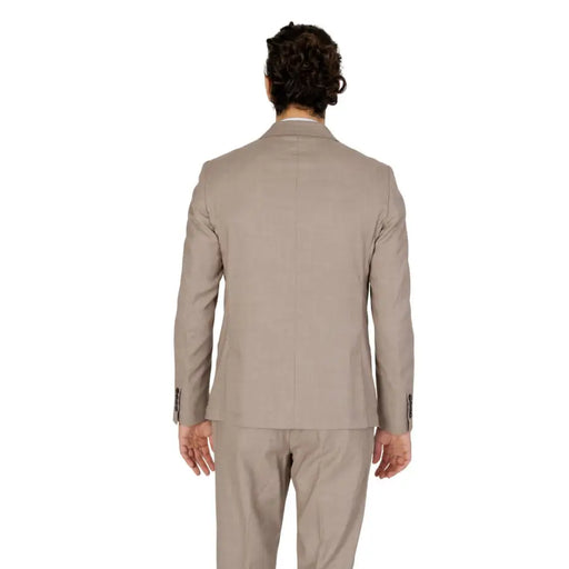 Antony Morato Veste blazer beige cintrée pour homme, en mélange de viscose, à la texture subtile et aux épaules structurées.