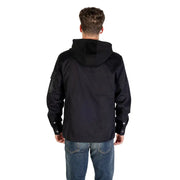Men’s black hooded blazer with front pockets paired with blue jeans for a stylish look