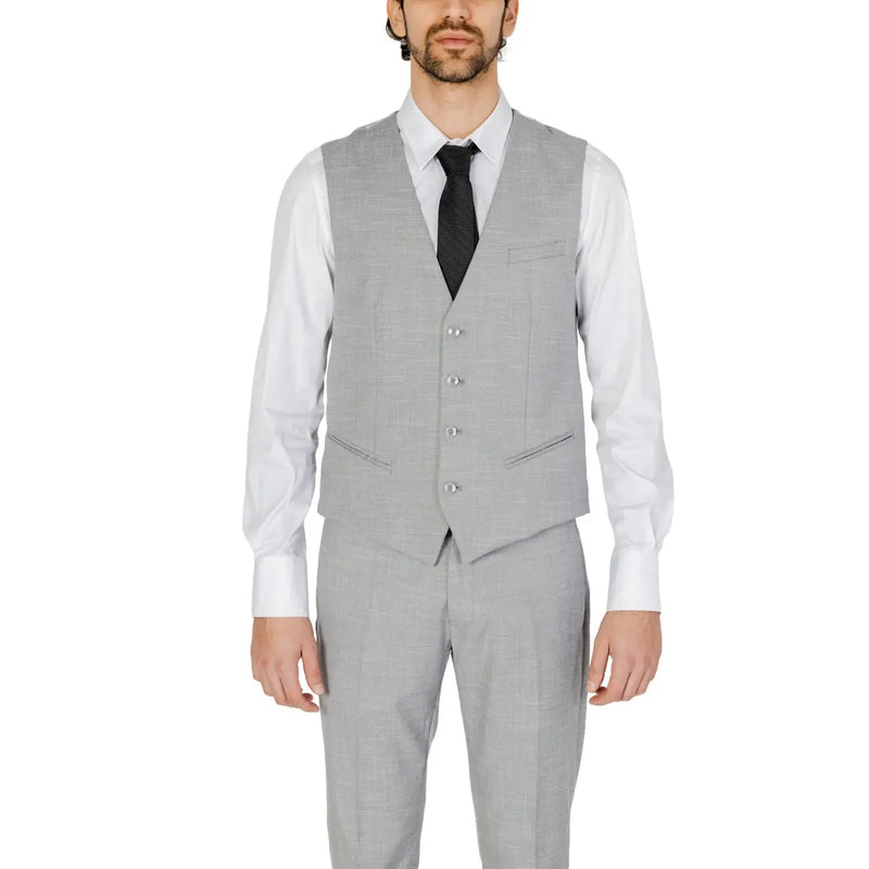 Antony Morato Gilet sans manches en laine grise unie pour homme, avec cinq boutons argentés et deux poches à rabat.