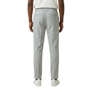 Antony Morato men grey slim-fit polyester viscose trousers with elastic waistband and two back pockets shown from the back side