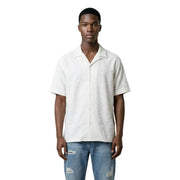Antony Morato Chemise blanche à manches courtes pour homme, boutonnée, avec broderie texturée discrète, idéale pour un style décontracté.