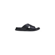 Antony Morato Sandales mules noires pour homme, modèle Kry, avec brides croisées minimalistes et semelle en caoutchouc texturée.