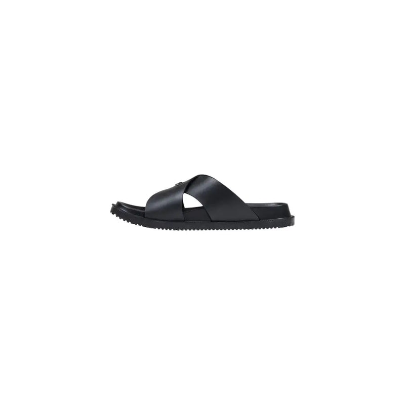 Antony Morato Pantoufles pour hommes Kry noires, sandales à bout ouvert en cuir noir, design minimaliste et semelle en caoutchouc texturé.