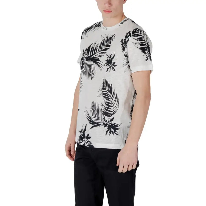 Antony Morato hommes t-shirt T-shirt blanc à manches courtes avec un imprimé audacieux de feuilles tropicales noires et de fleurs sur un tissu doux