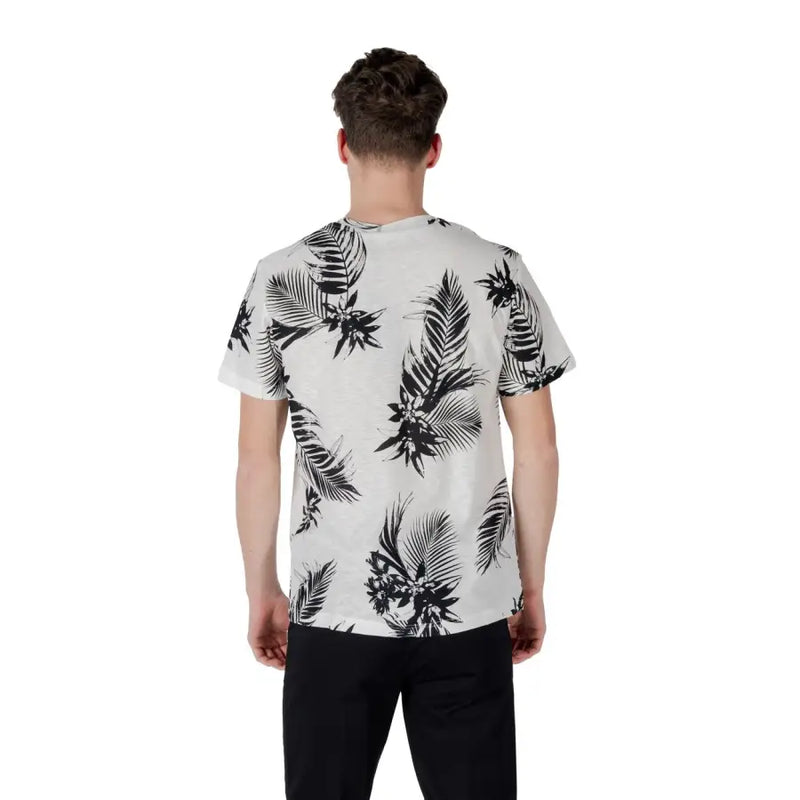 Antony Morato t-shirt blanc à manches courtes pour homme t-shirt avec un imprimé audacieux de feuilles tropicales noires et de fleurs sur le devant