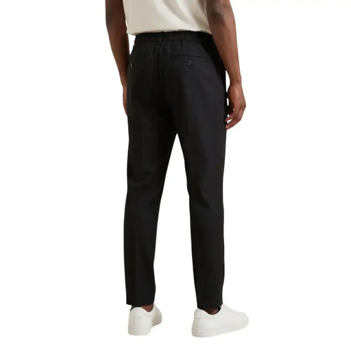Antony morato Pantalon noir pour homme, coupe ajustée, taille élastiquée avec cordon de serrage et poches arrière boutonnées (vue de dos)