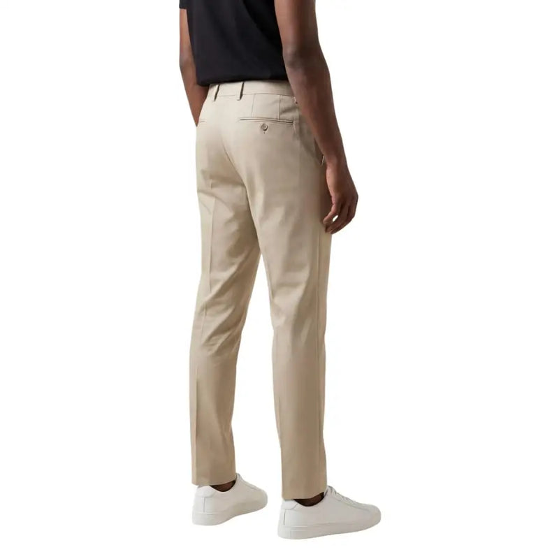 Antony Morato Pantalon chino beige pour homme, à la coupe ajustée et élégante, avec des détails de couture discrets pour une allure raffinée.