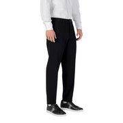 Armani Exchange Pantalon noir tailleur automne-hiver à la coupe droite élégante et aux détails de coutures latérales subtils.